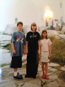 KT, middle, age 15. Because apparently black baggy clothes in mid-summer was necessary for some reason.
